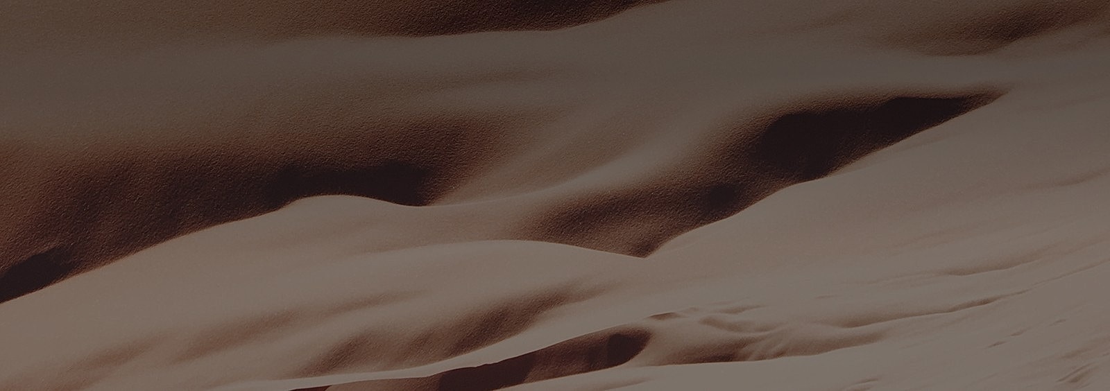 Abstract waves of soft earth tones.